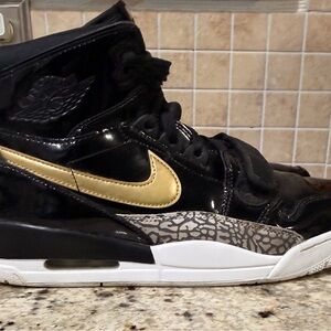 Jordan Black and Gold Athletic Shoes